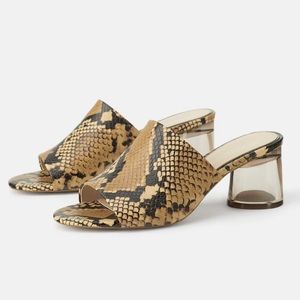 HIGH HEEL MULES WITH METHACRYLATE HEEL- SNAKE SKIN